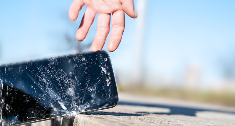 Phone being dropped onto the floor and smashing the screen
